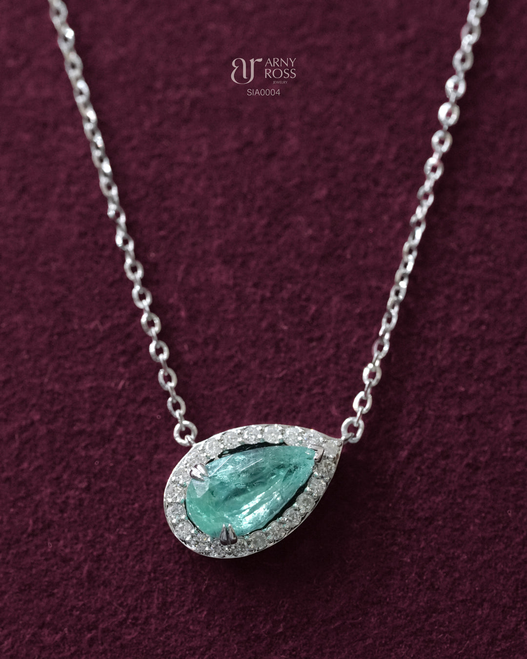 Tilted Pear Paraiba Necklace with Diamond Halo
